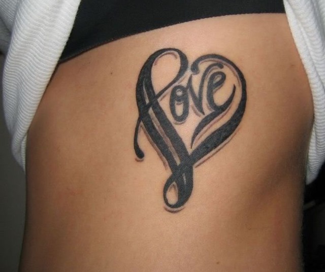 Photo:  heart-and-love-women-side-rib-tattoo